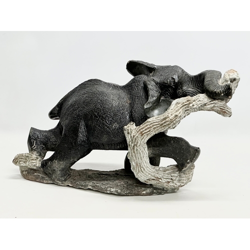 800A - A large soapstone elephant. 64x30x36cm.