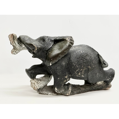 800A - A large soapstone elephant. 64x30x36cm.