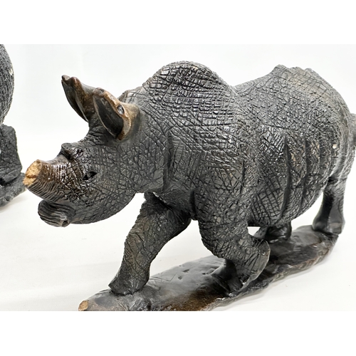 800B - 2 large soapstone rhinos. 40cm. 28cm.