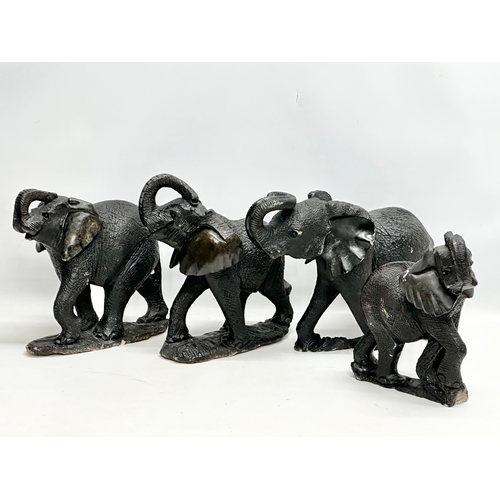 449 - 4 large soapstone elephants. 42cm