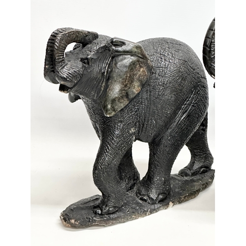 449 - 4 large soapstone elephants. 42cm