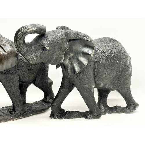 449 - 4 large soapstone elephants. 42cm