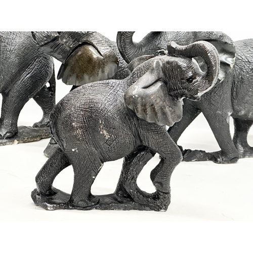 449 - 4 large soapstone elephants. 42cm