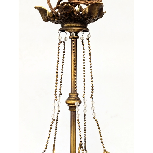 229 - A good quality Early 20th Century brass chandelier with glass shade. 63x77cm