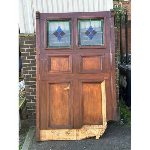 452 - A very large mahogany framed double sided panel with 2 stained glass windows. 151x245cm.