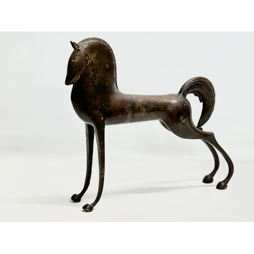 389 - A large bronzed Etruscan horse sculpture. In the manner of Boris Lovet-Borski. 45x43cm