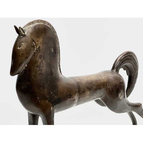 389 - A large bronzed Etruscan horse sculpture. In the manner of Boris Lovet-Borski. 45x43cm