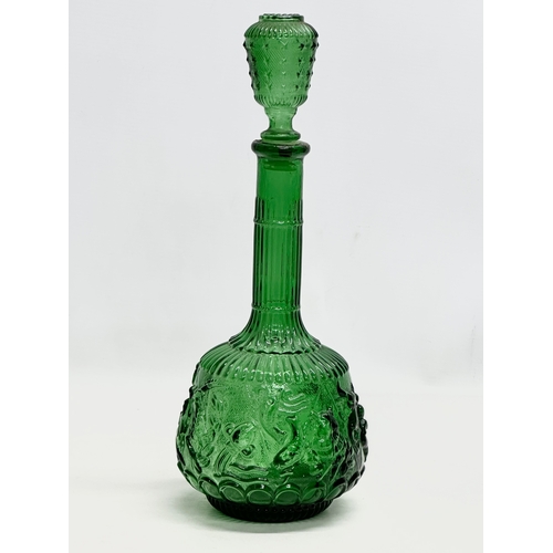 284 - An Italian Mid Century glass Genie decanter. Empoli, Italy. 35cm