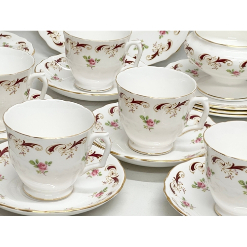 979 - A 21 piece Crown Staffordshire “Wentworth” tea service.