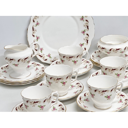 979 - A 21 piece Crown Staffordshire “Wentworth” tea service.