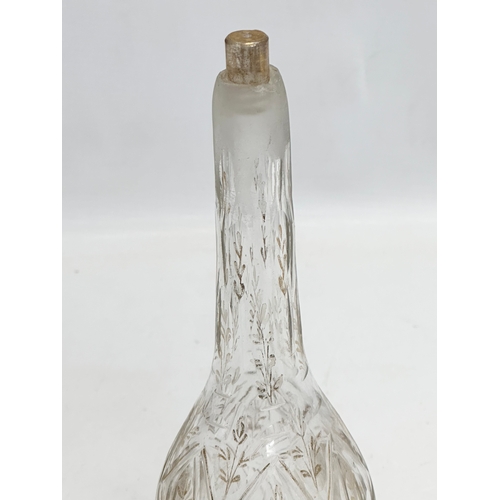 287 - A 19th Century Islamic style glass rose water sprinkler vase, with original screw lid. 26cm