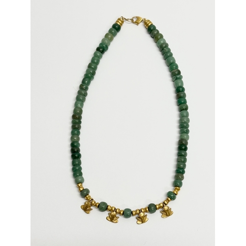 288 - 2 ladies jade necklaces.