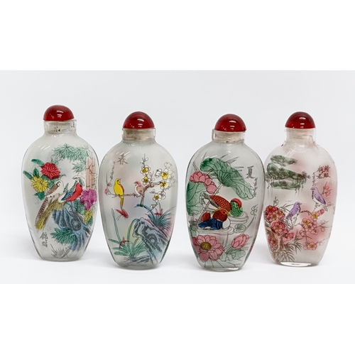 294 - A set of 4 20th Century Chinese glass scent bottles/snuff bottles.