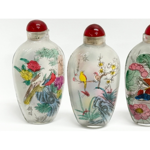 294 - A set of 4 20th Century Chinese glass scent bottles/snuff bottles.