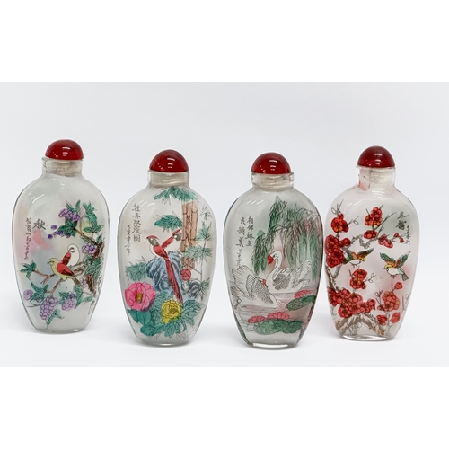 294 - A set of 4 20th Century Chinese glass scent bottles/snuff bottles.