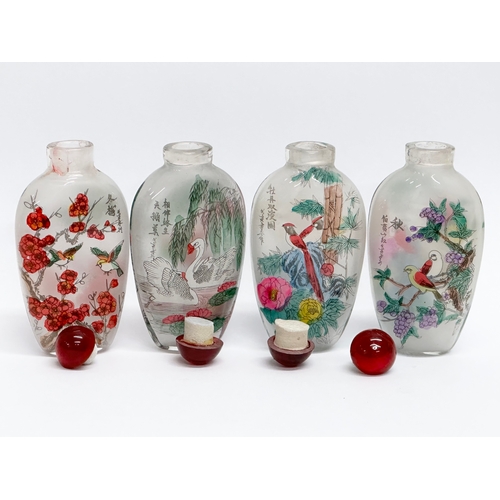 294 - A set of 4 20th Century Chinese glass scent bottles/snuff bottles.