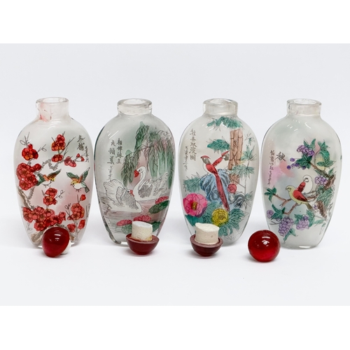 294 - A set of 4 20th Century Chinese glass scent bottles/snuff bottles.