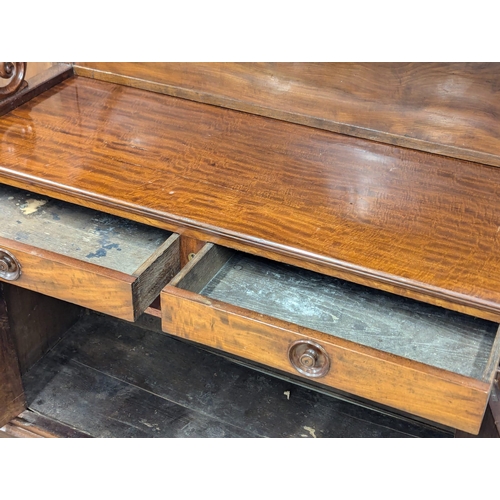 106 - A large Early William IV mahogany chiffonier with 2 drawers. Circa 1830. 128x49x181cm. 8