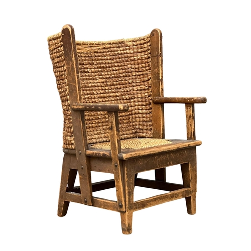 11 - A 19th Century child’s Orkney chair. 42x37x64cm. 4