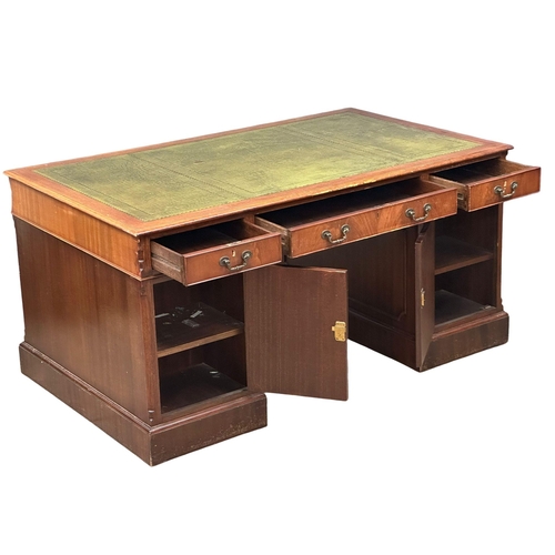 111 - A large Georgian style mahogany pedestal partners desk, with leather top. 153x92x76cm (1)