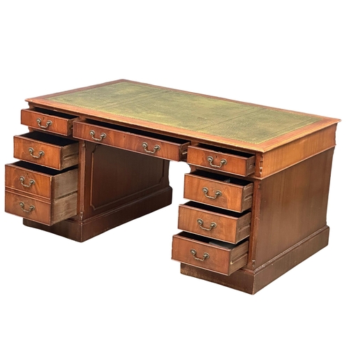 111 - A large Georgian style mahogany pedestal partners desk, with leather top. 153x92x76cm (1)