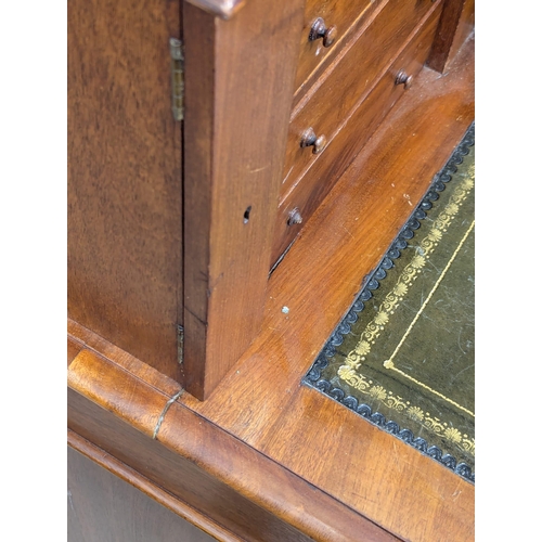 119 - A 19th Century Victorian mahogany Dickens desk with original leather top. 145x70x108.5cm. 3