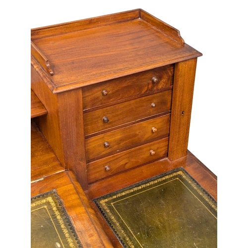 119 - A 19th Century Victorian mahogany Dickens desk with original leather top. 145x70x108.5cm. 3