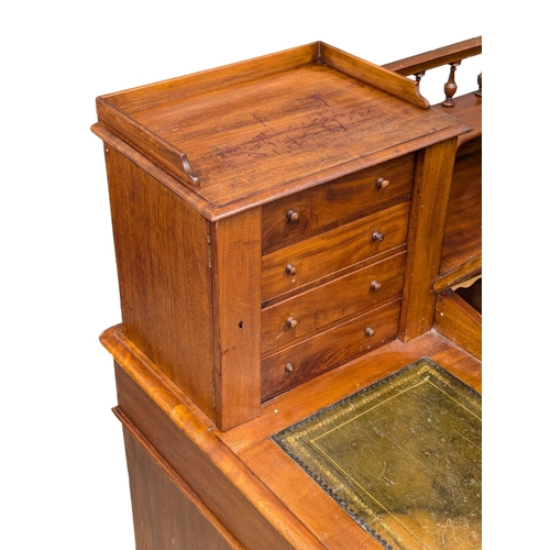 119 - A 19th Century Victorian mahogany Dickens desk with original leather top. 145x70x108.5cm. 3