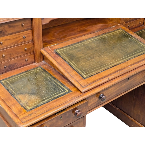 119 - A 19th Century Victorian mahogany Dickens desk with original leather top. 145x70x108.5cm. 3