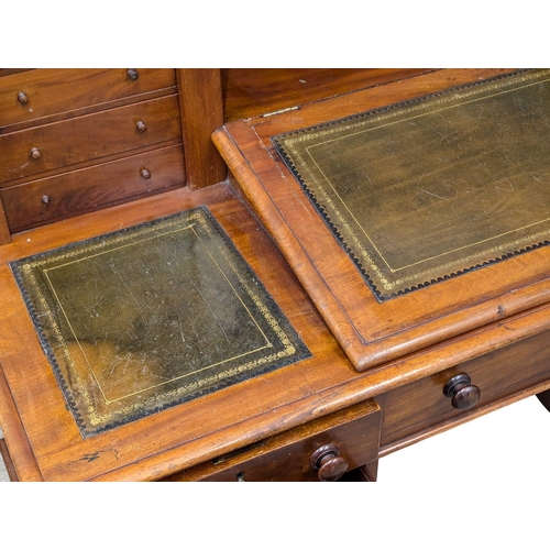 119 - A 19th Century Victorian mahogany Dickens desk with original leather top. 145x70x108.5cm. 3