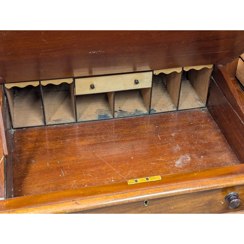 119 - A 19th Century Victorian mahogany Dickens desk with original leather top. 145x70x108.5cm. 3