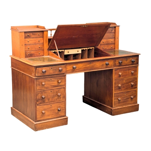 119 - A 19th Century Victorian mahogany Dickens desk with original leather top. 145x70x108.5cm. 3