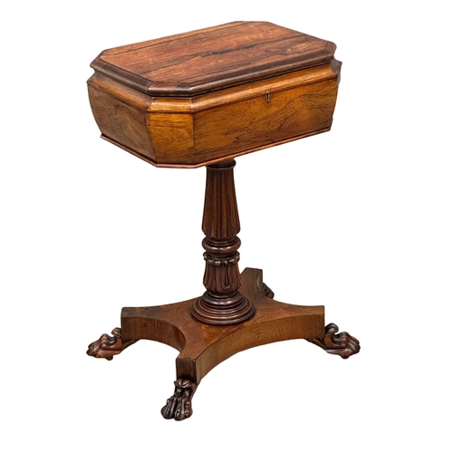 125 - An Early William IV rosewood teapoy, with lion paw feet. Circa 1830. 55x42x75cm (1)