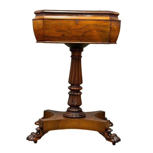 125 - An Early William IV rosewood teapoy, with lion paw feet. Circa 1830. 55x42x75cm (1)