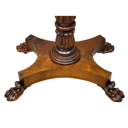 125 - An Early William IV rosewood teapoy, with lion paw feet. Circa 1830. 55x42x75cm (1)