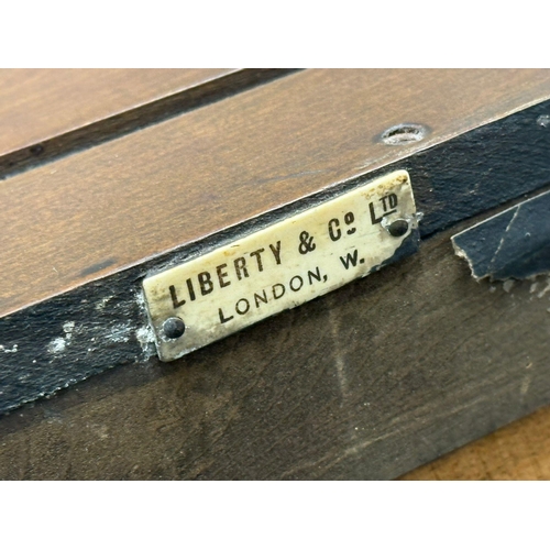 14 - Liberty & Co LTD. A Cecil Aldin Early 20th Century Arts & Crafts framed Chromotypograph wall shelf. ... 