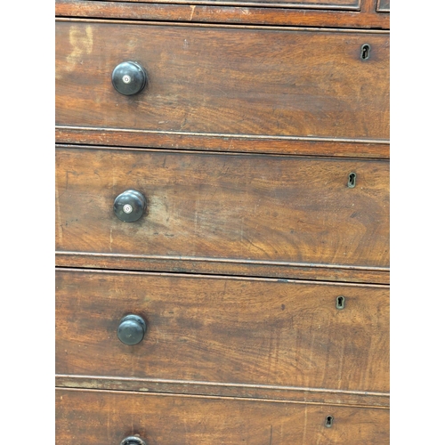 142 - A large Late George III mahogany chest of drawers. Circa 1800-1820. 110x53x111cm (2)