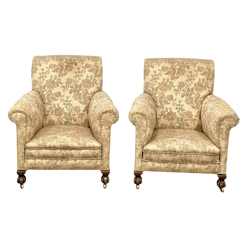 144 - A pair of Late 19th Century Victorian country house armchairs on ball & claw feet. Circa 1890-1900. ... 