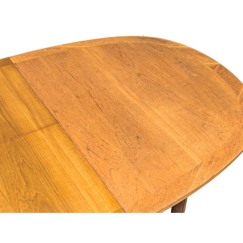 147 - A Mid Century teak extending dining table and 4 chairs by Nathan Furniture. 206x99x75cm (2)