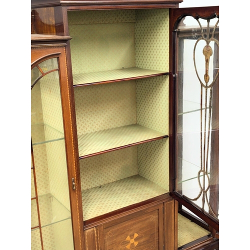 150 - A large Edward VII inlaid mahogany display cabinet. Early 20th Century. Edwardian. Circa 1901-1910. ... 