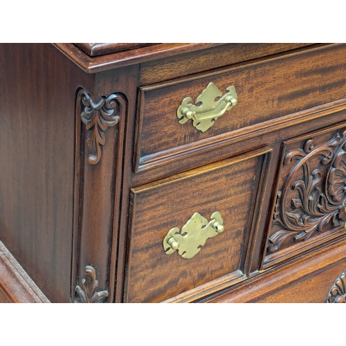 155 - A large American Chippendale style mahogany chest on chest on Ball & Claw feet. 92x41x216cm. 6