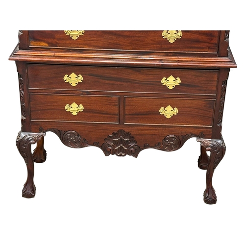 156 - A large American Chippendale style mahogany chest on chest, on ball and claw feet. 105x43x196cm. 2