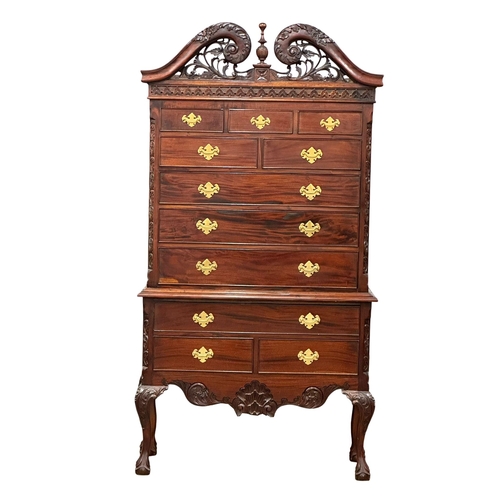 156 - A large American Chippendale style mahogany chest on chest, on ball and claw feet. 105x43x196cm. 2