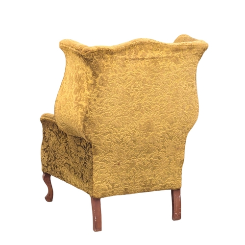 161 - An Early 20th Century Georgian style wingback armchair. Circa 1900-1910. 2