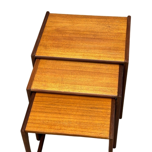 164 - A G-Plan “Quadrille” Mid Century teak nest of tables. Designed by Roger Bennett. (5)