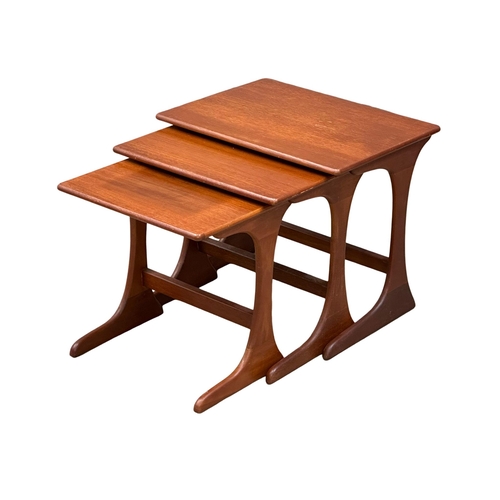 168 - A Mid Century teak nest of tables. (5)