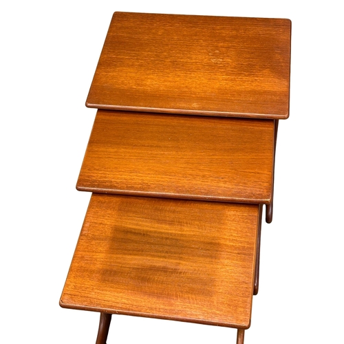 168 - A Mid Century teak nest of tables. (5)