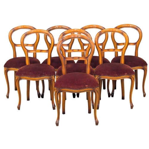 550A - A large inlaid pedestal dining table with 8 balloon back chairs. 142cm. 3