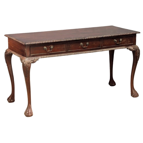 223 - An Irish Chippendale style mahogany sofa table with 3 drawers and 3 dummy drawers on Ball & Claw fee... 