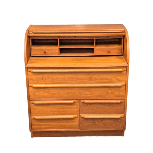 225 - A Danish Mid Century teak cylinder writing bureau. 90x48x100cm (3)